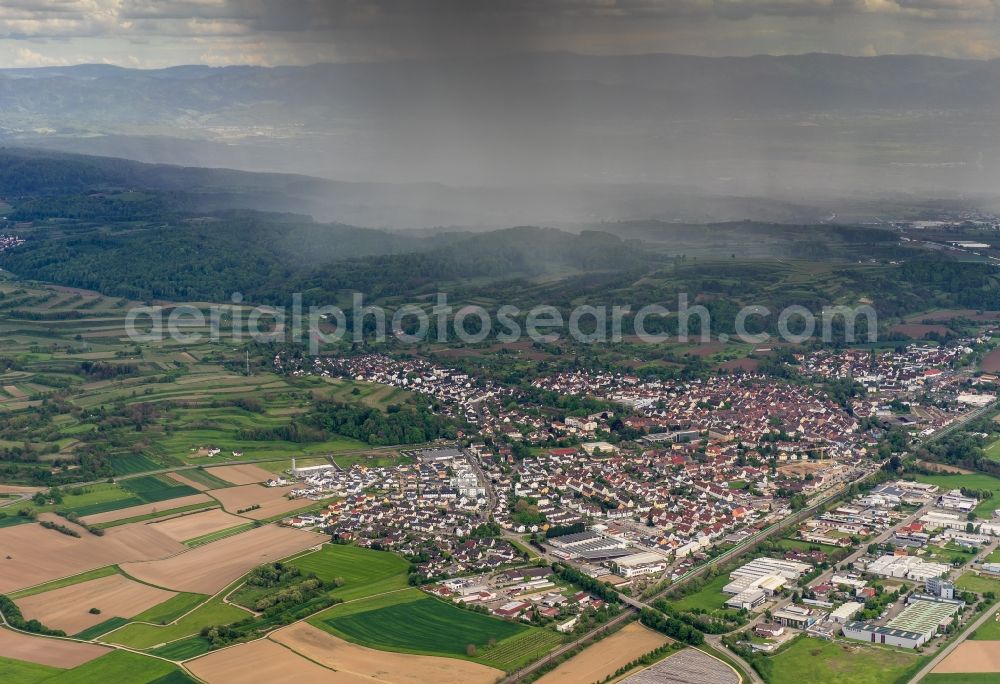 Kenzingen from above - Haze and precipitation conditions with rainbow formation in Kenzingen in the state Baden-Wuerttemberg, Germany