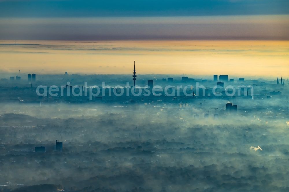 Hamburg from the bird's eye view: Weather with layered fog cover over the city area in Hamburg, Germany