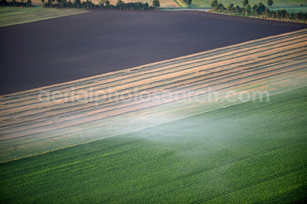 Aerial photograph Rathmannsdorf - Weather with layered fog cover on a field landscape in Rathmannsdorf in the state Saxony-Anhalt, Germany