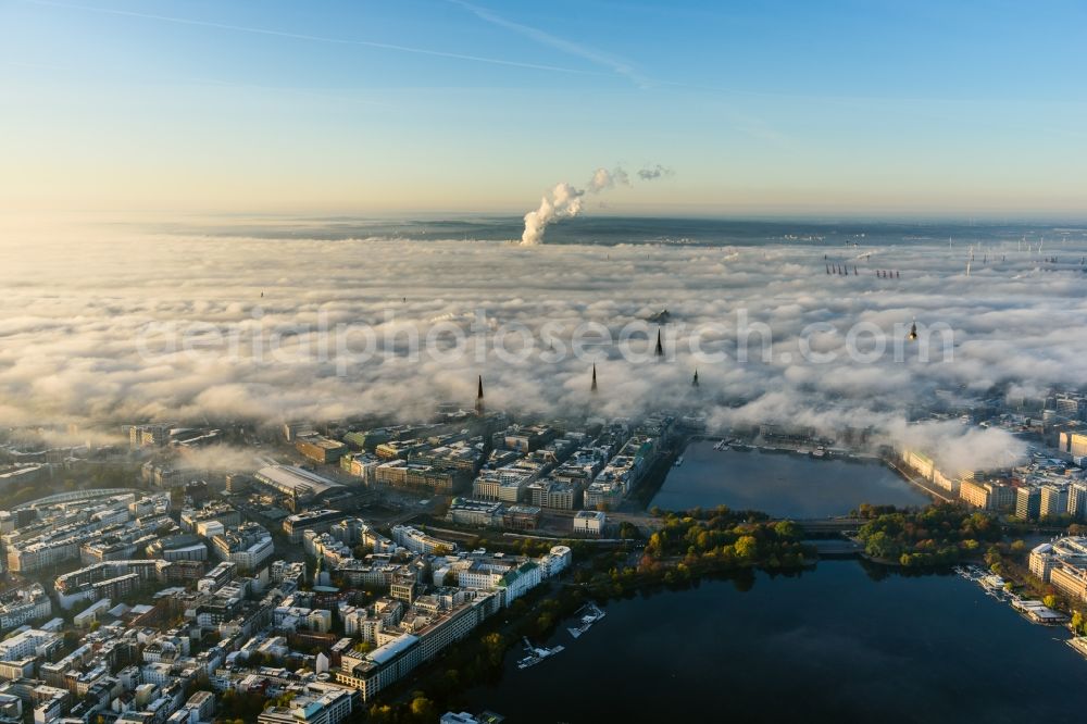 Hamburg from the bird's eye view: Weather with layered fog cover above Hamburg downtown, Germany