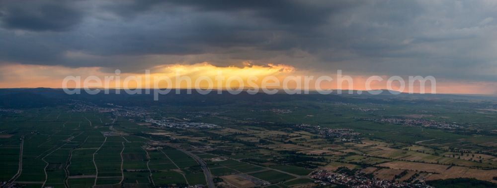 Aerial photograph Birkenheide - Weather situation with solar radiation from openings of the cloud cover over the palatinate mountain shore in Birkenheide in the state Rhineland-Palatinate