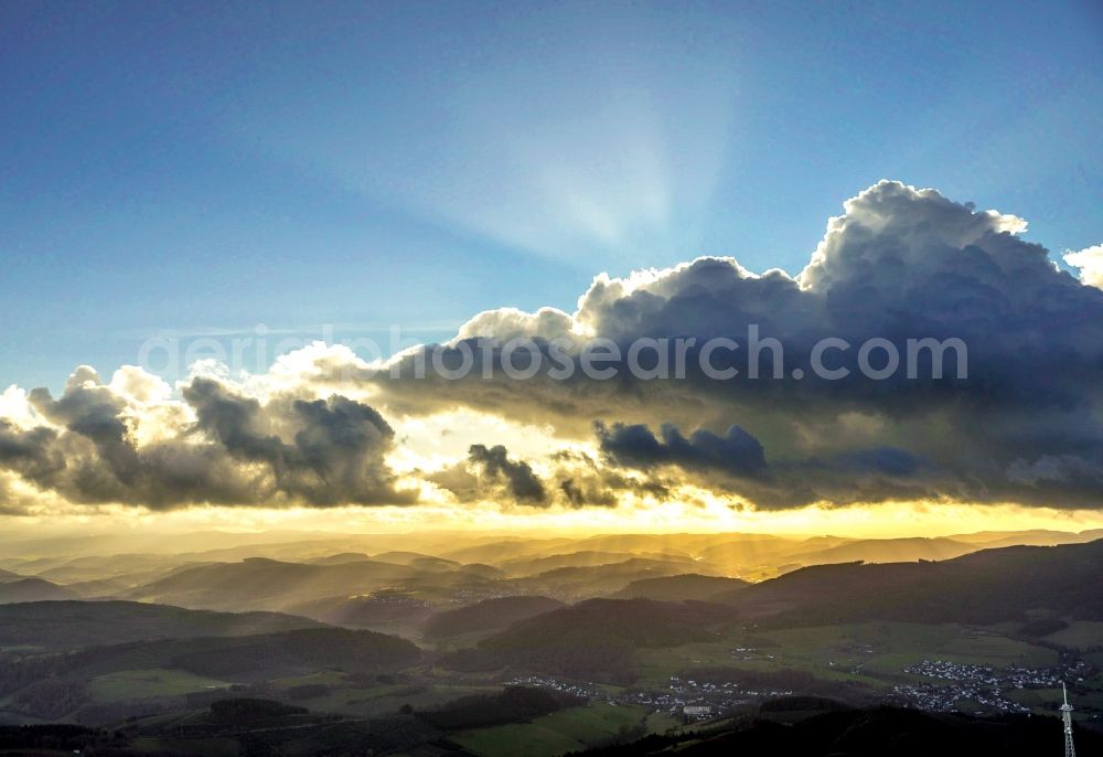 Aerial image Eslohe (Sauerland) - Weather situation with solar radiation from openings of the cloud cover in the district Oesterberge in Eslohe (Sauerland) in the state North Rhine-Westphalia, Germany