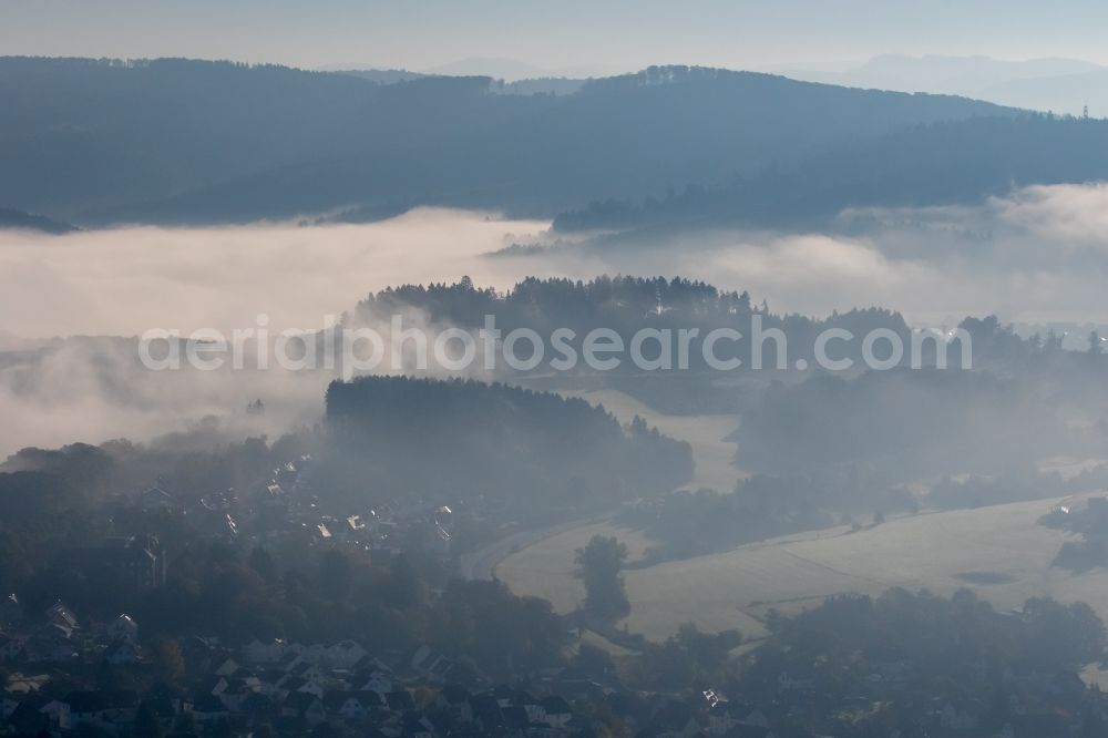 Arnsberg from the bird's eye view: Weather conditions with cloud formation over the Arnsberg forest in Arnsberg in the state North Rhine-Westphalia