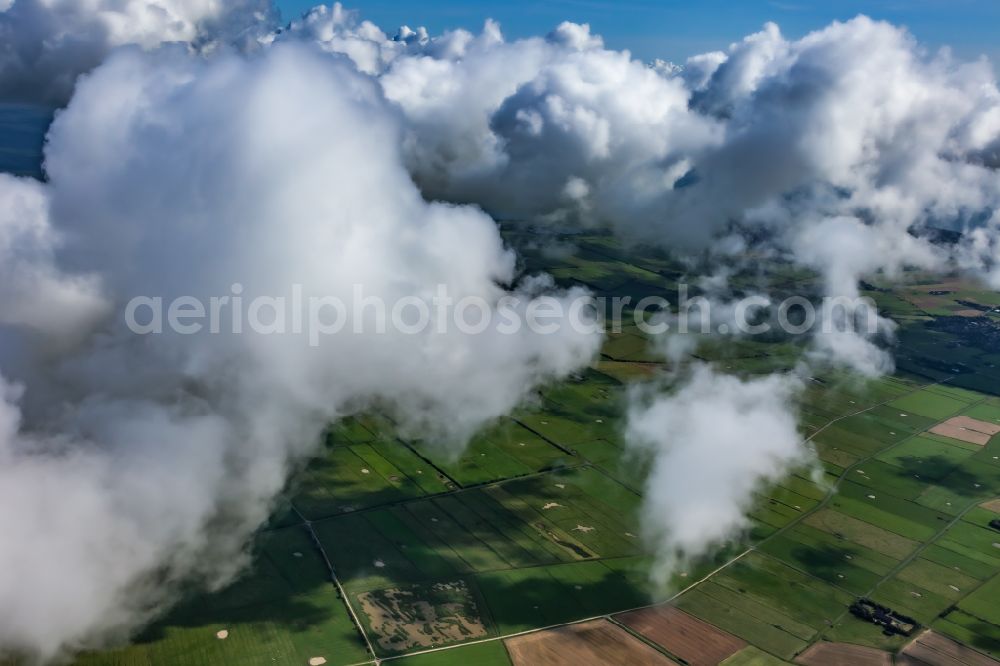 Aerial photograph Midlum - Weather conditions with cloud formation over the island of Foehr in Midlum Nordfriesland in the state Schleswig-Holstein, Germany