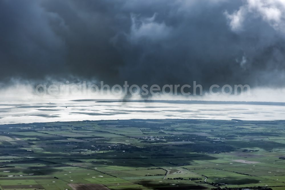 Aerial image Oevenum - Weather conditions with cloud formation ueber landwirtschaftlichen Flaechen of Insel Foehr in Oevenum North Friesland in the state Schleswig-Holstein, Germany