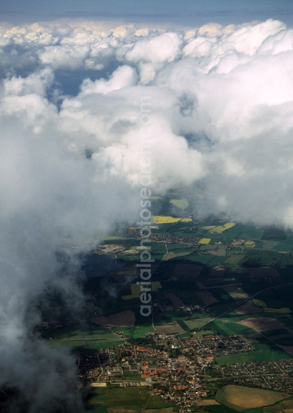 Broager from the bird's eye view: Weather conditions with cloud formation over the shore of the Flensburger Foerde in Broager in Syddanmark in Denmark