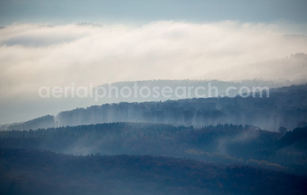 Aerial image Dachsenhausen - Weather conditions with cloud formation and high fog above the forest landscape at Dachsenhausen in the state Rhineland-Palatinate