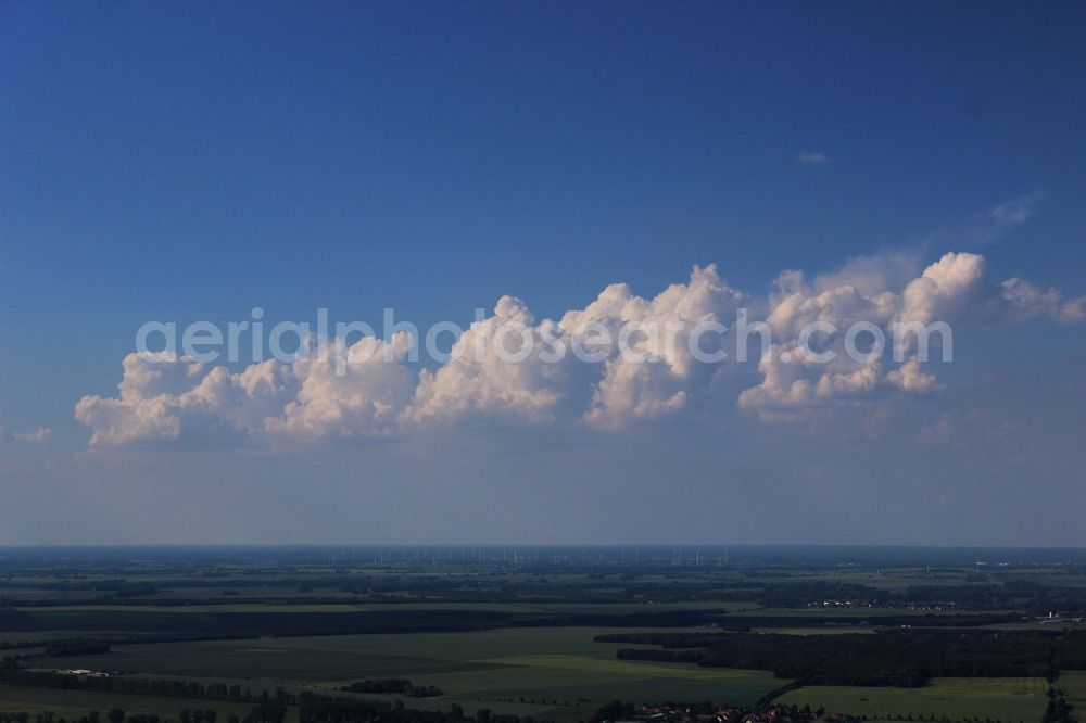 Fehrbellin from the bird's eye view: Weather conditions with cloud formation - on blue Sky in Fehrbellin in the state Brandenburg