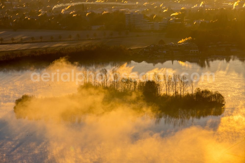 Aerial photograph Hilden - Weather situation with cloud formation and light reflections at sunrise over the Elbsee in the district Stadtbezirk 8 in Hilden in the state North Rhine-Westphalia