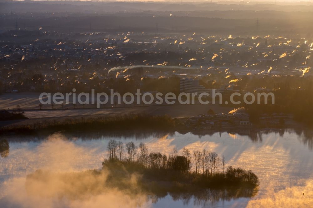 Aerial image Hilden - Weather situation with cloud formation and light reflections at sunrise over the Elbsee in the district Stadtbezirk 8 in Hilden in the state North Rhine-Westphalia