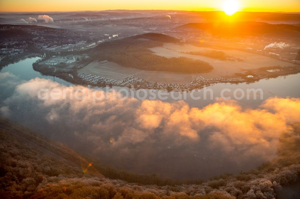 Wetter (Ruhr) from the bird's eye view: Weather situation with cloud formation and light reflections at sunrise over the lake landscape of Harkortsee in the district Westende in Wetter (Ruhr) in the state North Rhine-Westphalia