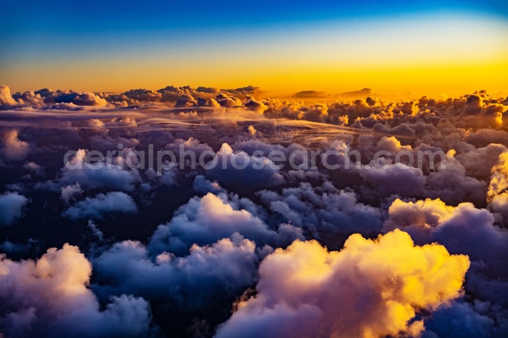 Aerial photograph Sankt Peter-Ording - Weather situation with cloud formation and light reflections at sunset in Sankt Peter-Ording in the state Schleswig-Holstein, Germany