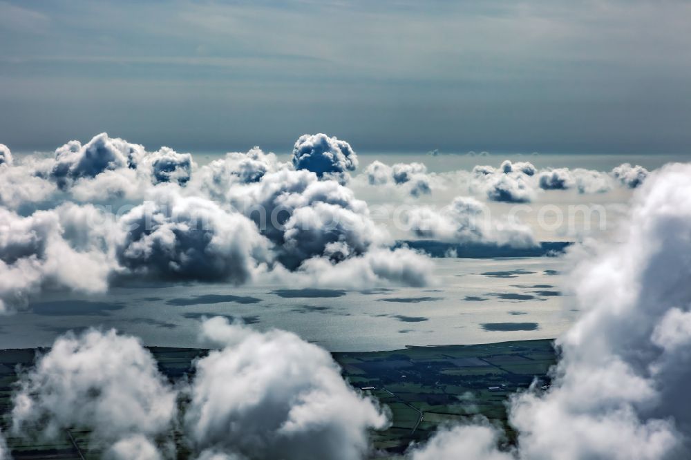 Nieblum from the bird's eye view: Weather conditions with cloud formation ueber dem Wattenmeer in Nieblum island Foehr in the state Schleswig-Holstein, Germany