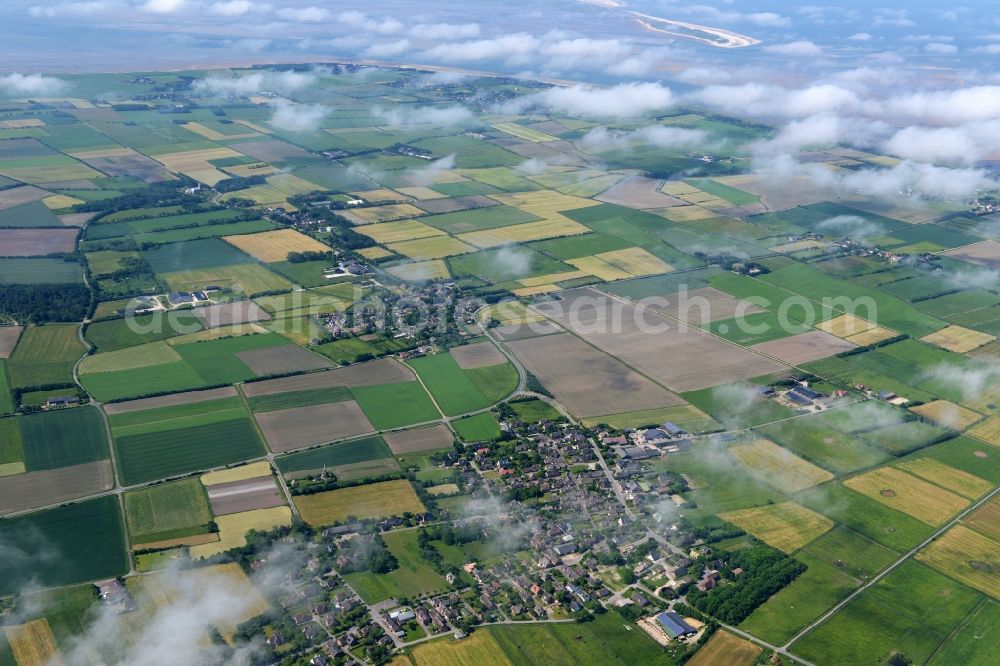 Oldsum from the bird's eye view: Weather conditions with cloud formation above the fields in Oldsum in the state Schleswig-Holstein