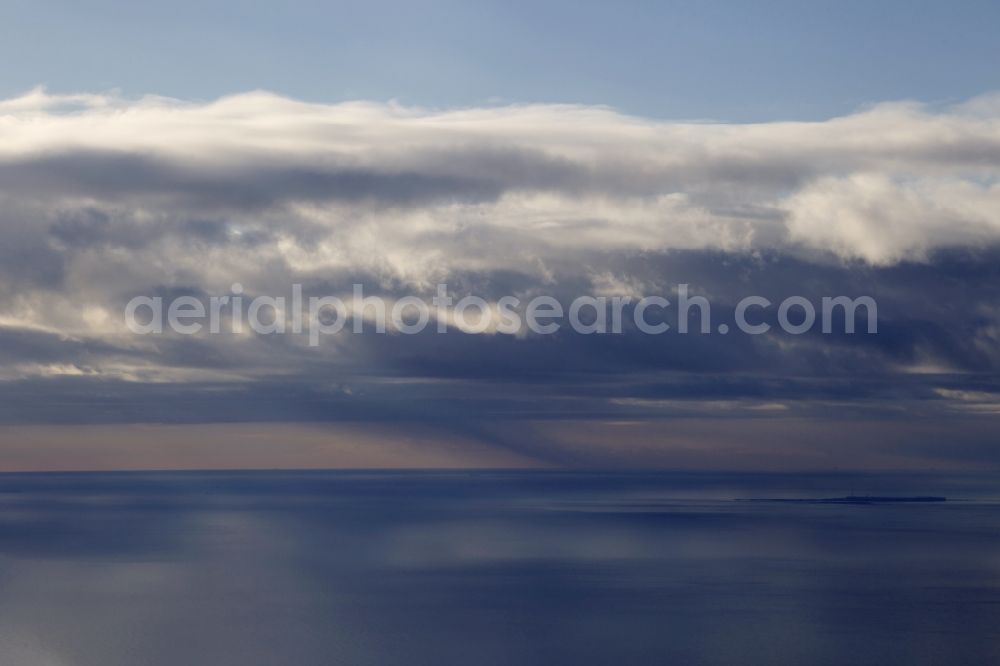 Sankt Peter-Ording from above - Weather conditions with cloud formation over the North Sea in St. Peter-Ording in Schleswig-Holstein. Looking west toward the island of Helgoland. Snow showers