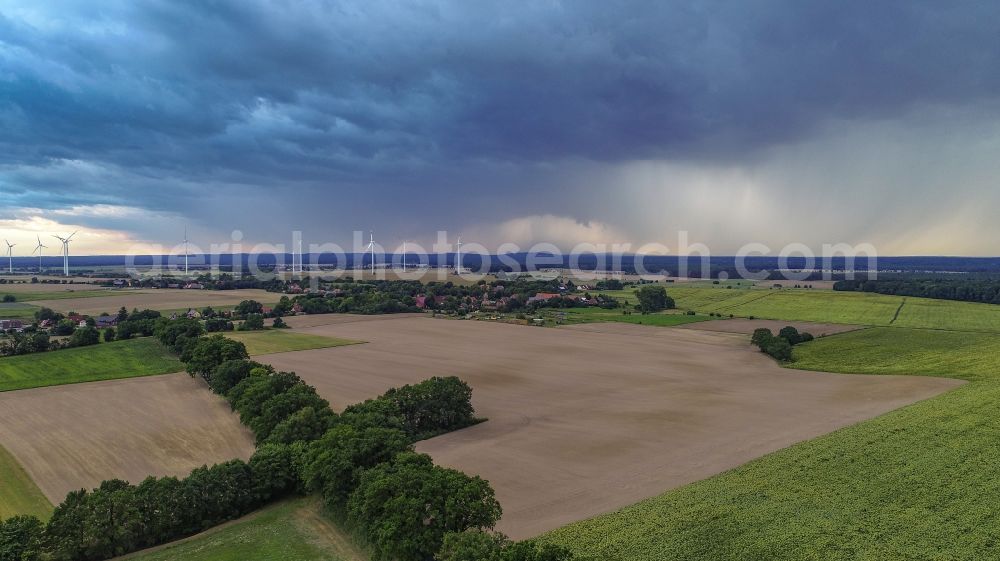 Sieversdorf from the bird's eye view: Weather conditions with cloud formation over fields in Sieversdorf in the state Brandenburg, Germany