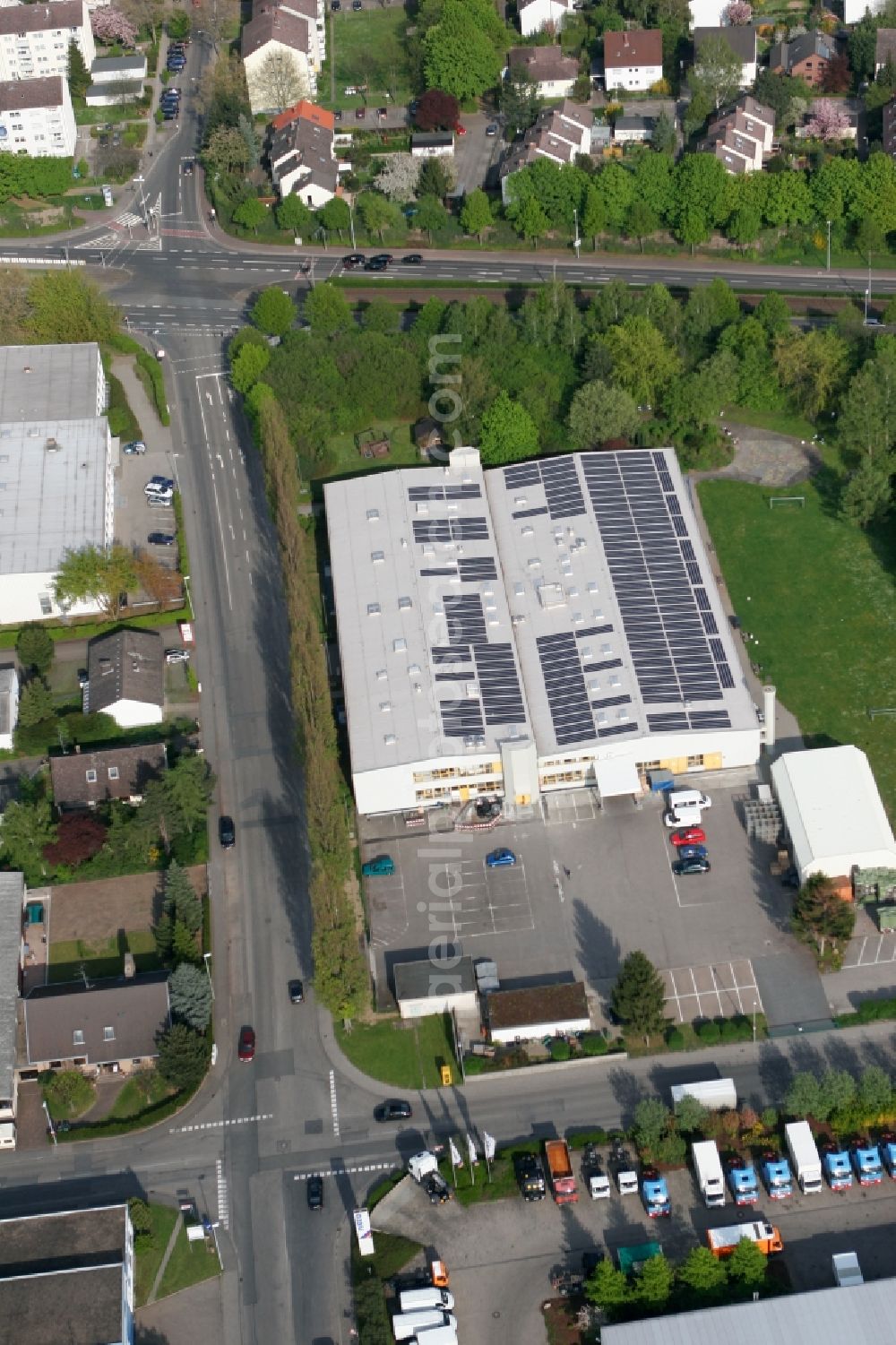 Mainz from the bird's eye view: Warehouse of WfB manufacturing and service workshops for disabled people Mainz gGmbH in the industrial area at the Robert - Koch - street in Mainz in Rhineland-Palatinate