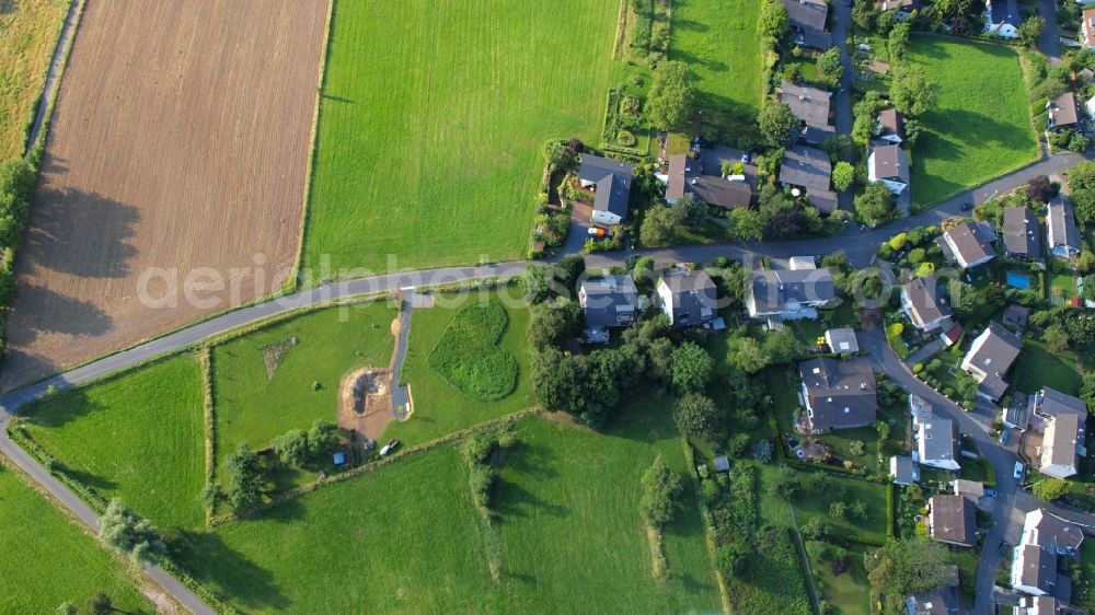 Rauschendorf from the bird's eye view: Meadow in heart shape in Koenigswinter-Rauschendorf in the state North Rhine-Westphalia, Germany