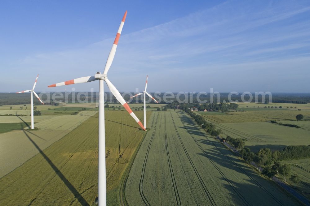 Sülbeck from the bird's eye view: Wind turbine windmill on a field in Suelbeck in the state Lower Saxony