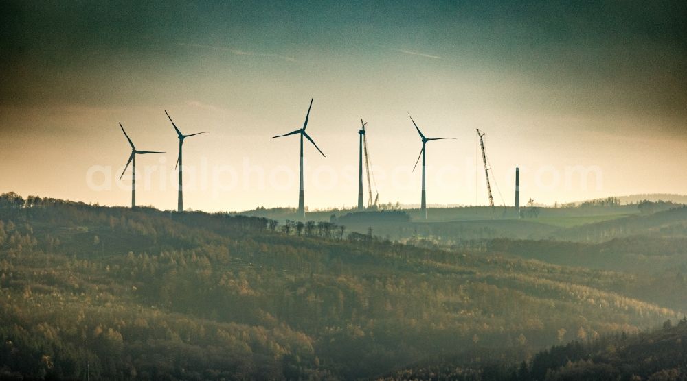 Blintrup from the bird's eye view: Wind turbine windmills on a field in Blintrup in the state North Rhine-Westphalia, Germany