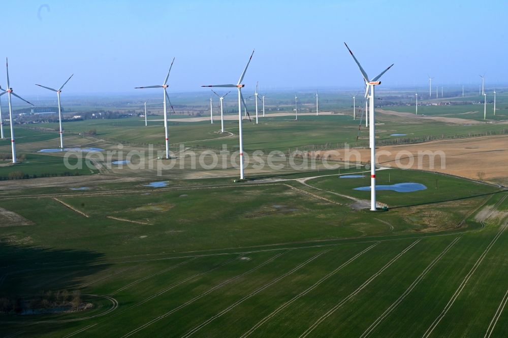 Gollmitz from the bird's eye view: Wind turbine windmills on a field in Gollmitz in the state Brandenburg, Germany