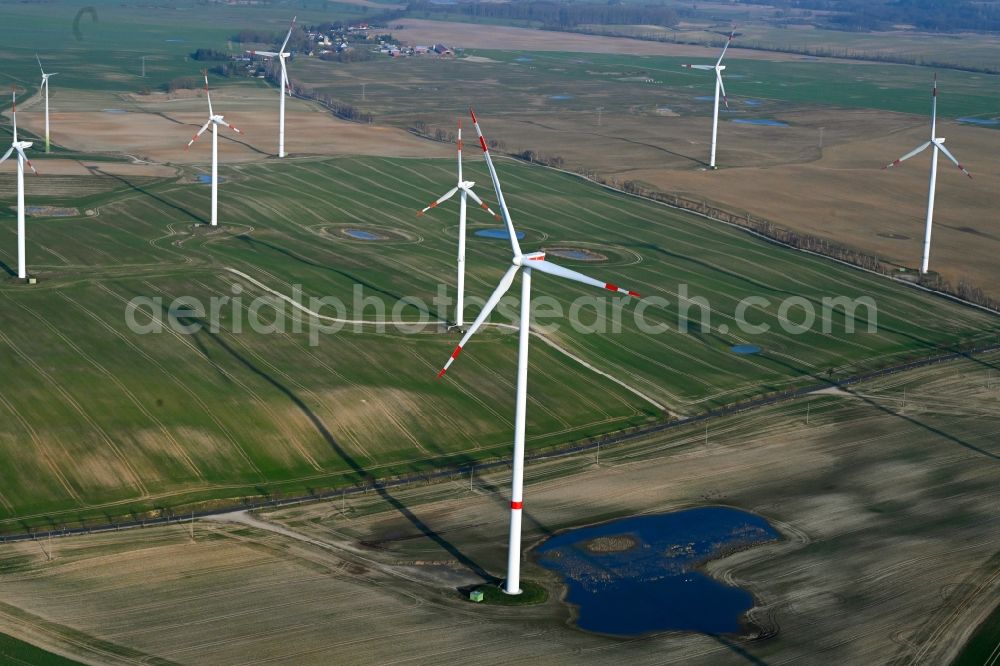 Gollmitz from the bird's eye view: Wind turbine windmills on a field in Gollmitz in the state Brandenburg, Germany