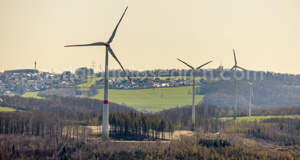 Hohenlimburg from the bird's eye view: Wind turbine windmills on a field in Hohenlimburg in the state North Rhine-Westphalia, Germany