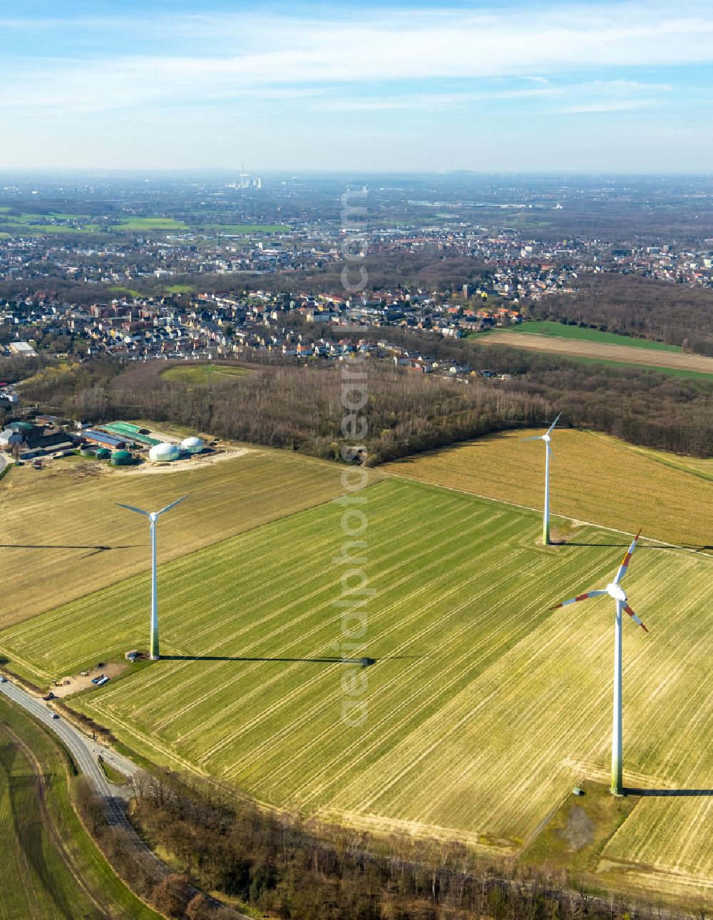 Mengede from the bird's eye view: Wind turbine windmills on a field in Mengede in the state North Rhine-Westphalia, Germany