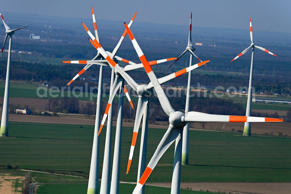 Quellendorf from above - Wind turbine windmills on a field in Quellendorf in the state Saxony-Anhalt, Germany