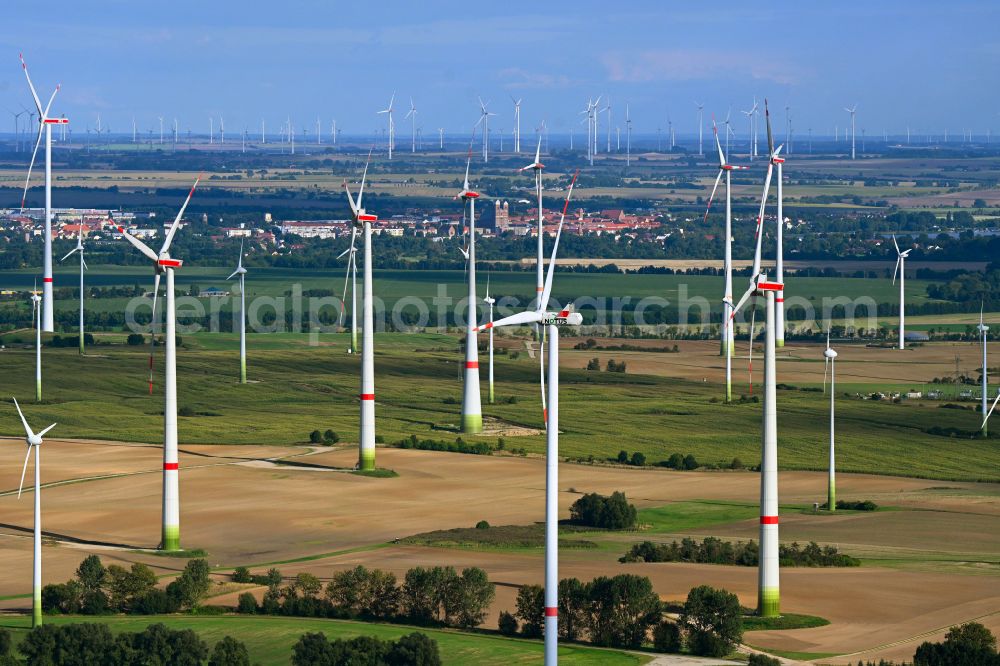 Schönermark from the bird's eye view: Wind turbine windmills on a field in Schoenermark Uckermark in the state Brandenburg, Germany