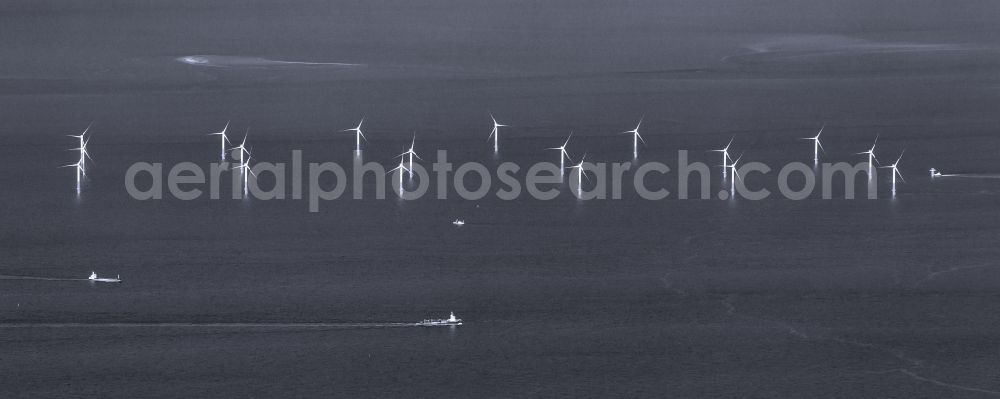 Nordergründe from above - Wind turbines of the offshore wind farm on the water surface of North Sea in Nordergruende in the state Lower Saxony, Germany