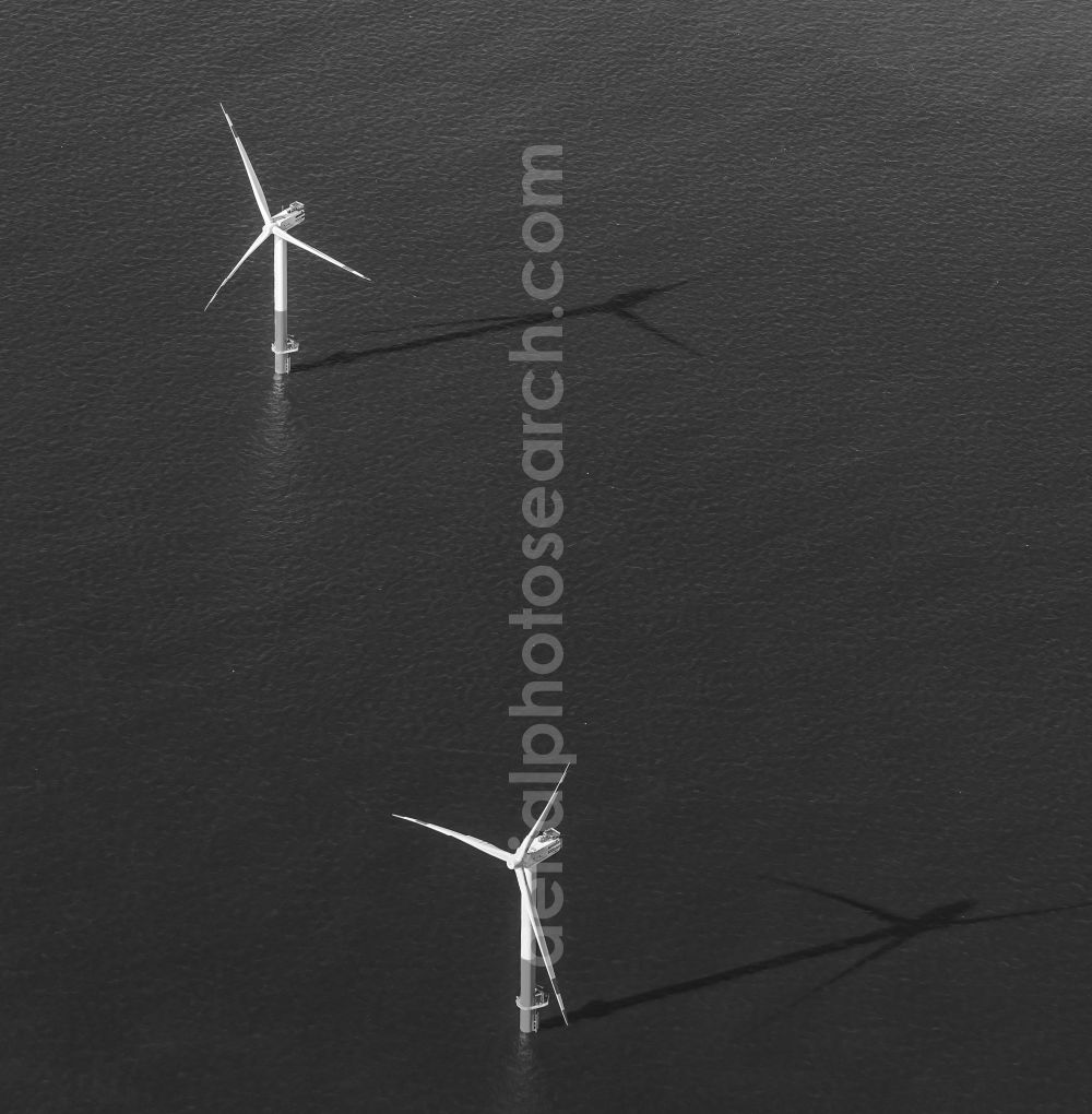 Nordergründe from above - Wind turbines of the offshore wind farm on the water surface of North Sea in Nordergruende in the state Lower Saxony, Germany