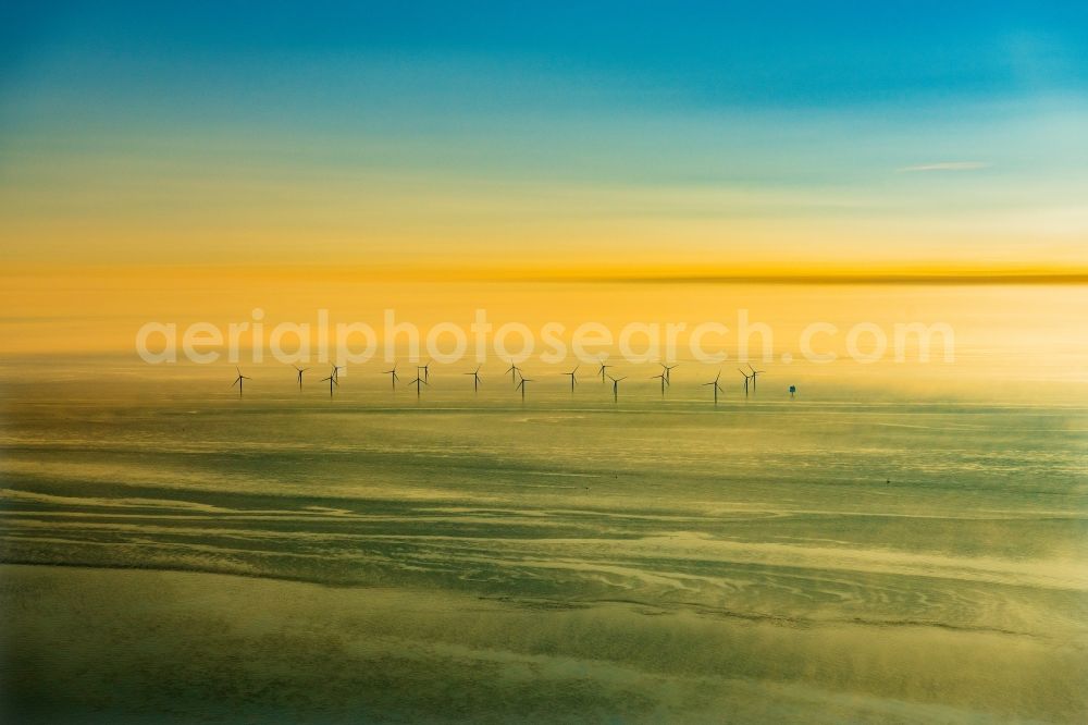 Aerial image Nordergründe - Wind turbines of the offshore wind farm on the water surface of North Sea in Nordergruende in the state Lower Saxony, Germany