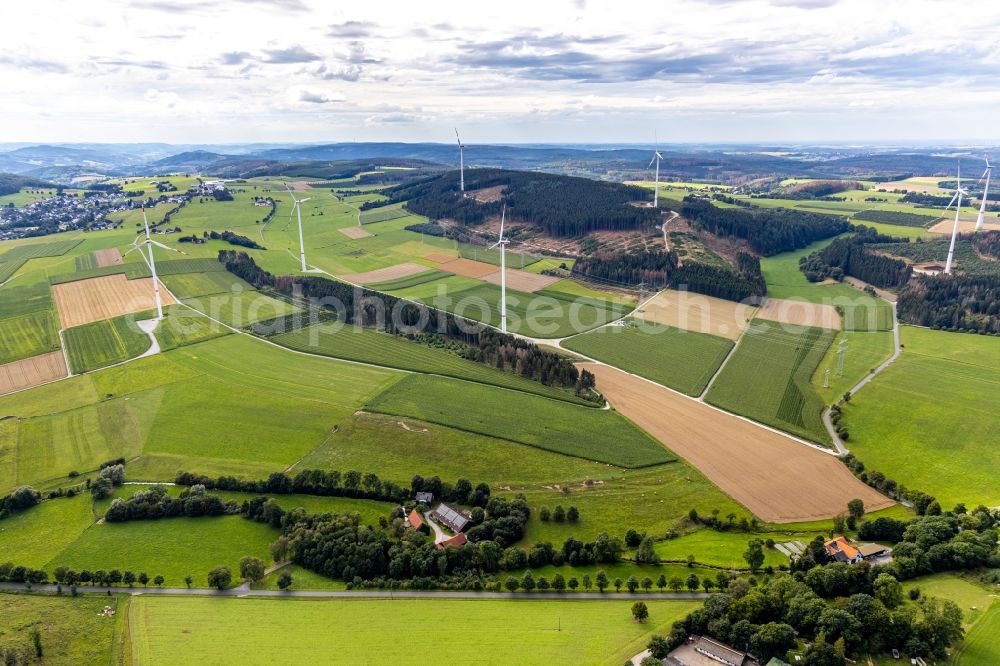 Altenbüren from the bird's eye view: Wind turbine windmills on a field in Altenbueren in the state North Rhine-Westphalia, Germany