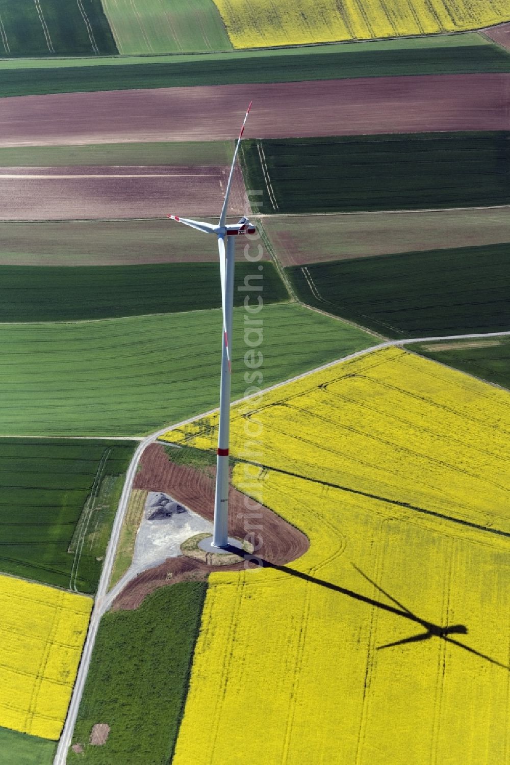 Arnstein from above - Wind turbine windmills on a field in Arnstein in the state Bavaria, Germany