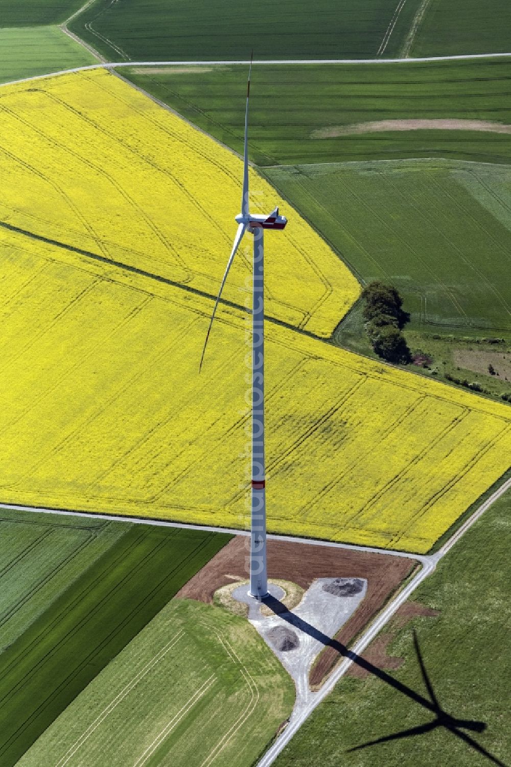 Arnstein from the bird's eye view: Wind turbine windmills on a field in Arnstein in the state Bavaria, Germany