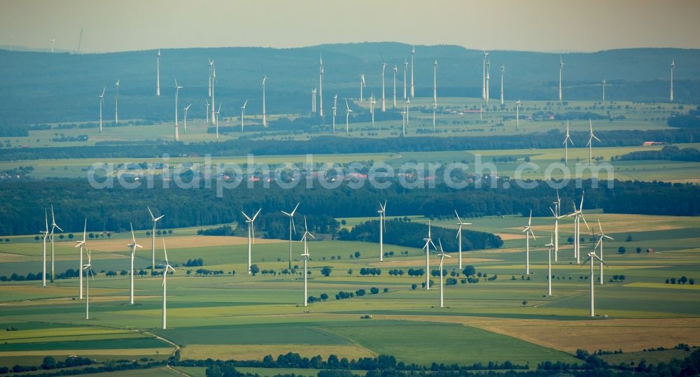 Bad Wünnenberg from the bird's eye view: Wind turbine windmills on a field in Bad Wuennenberg in the state North Rhine-Westphalia