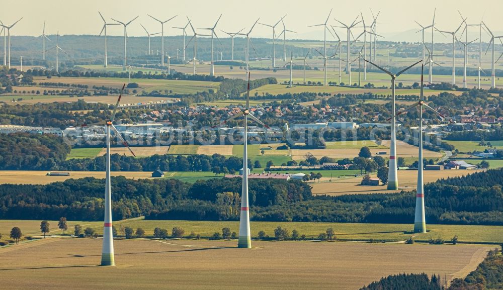 Büren from the bird's eye view: Wind turbine windmills on a field in Bueren in the state North Rhine-Westphalia, Germany