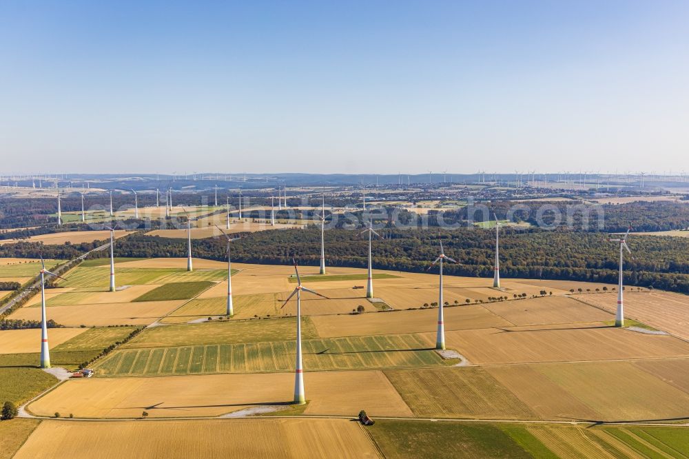 Aerial photograph Büren - Wind turbine windmills on a field in Bueren in the state North Rhine-Westphalia, Germany