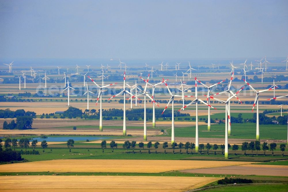 Aerial image Brunsbüttel - Wind turbine windmills on a field in Brunsbuettel in the state Schleswig-Holstein