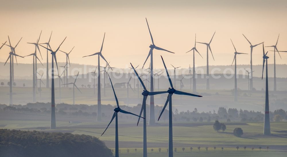 Aerial photograph Dahl - Wind turbine windmills - embedded in a fog layer on a field in Dahl in the state North Rhine-Westphalia, Germany