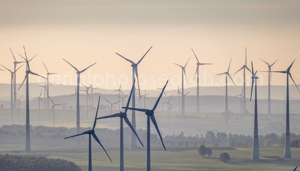 Dahl from above - Wind turbine windmills - embedded in a fog layer on a field in Dahl in the state North Rhine-Westphalia, Germany