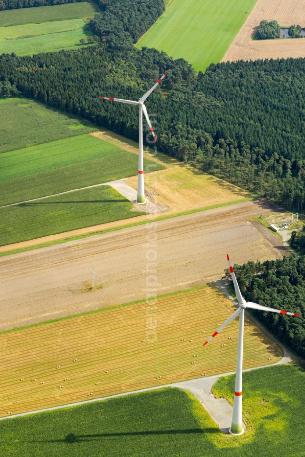 Aerial photograph Deinste - Wind turbine windmills on a field in Deinste in the state Lower Saxony, Germany