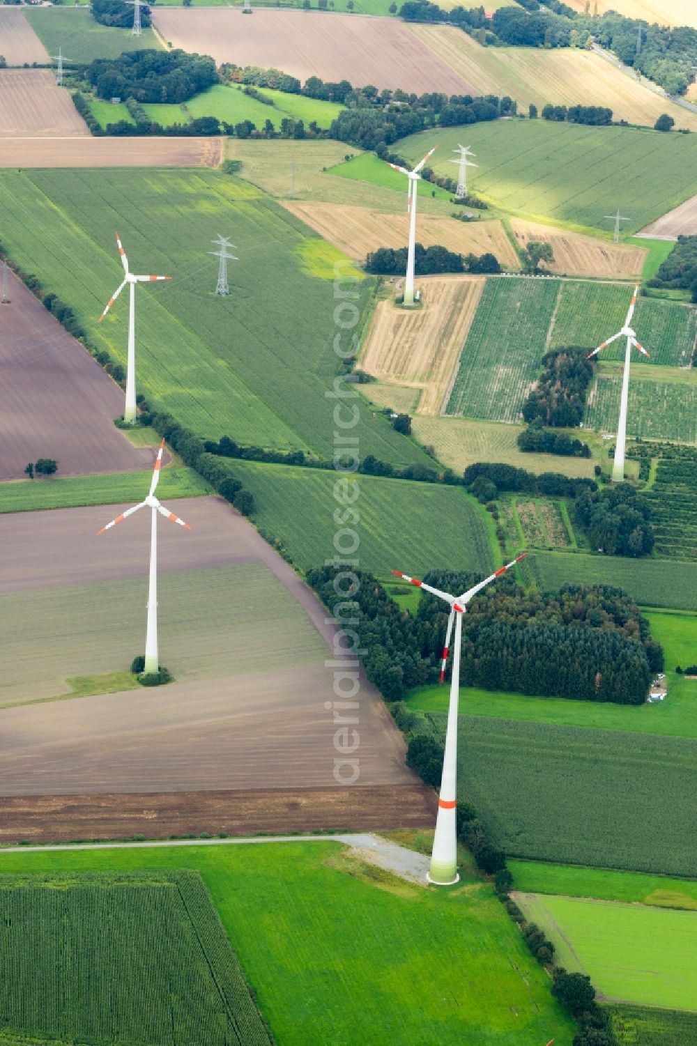 Aerial image Deinste - Wind turbine windmills on a field in Deinste in the state Lower Saxony, Germany