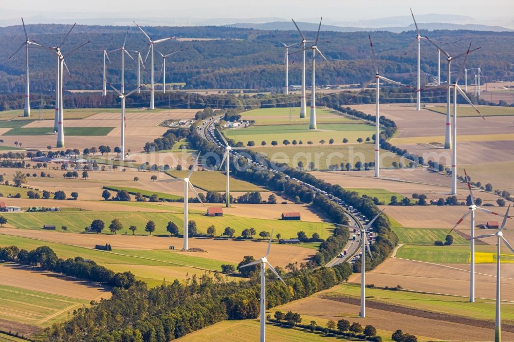 Bad Wünnenberg from above - Wind turbine windmills on a field along the BAB A44 in Bad Wuennenberg in the state North Rhine-Westphalia, Germany