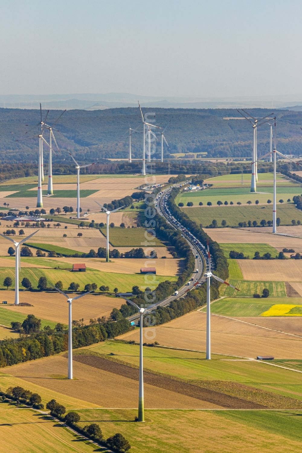 Aerial photograph Bad Wünnenberg - Wind turbine windmills on a field along the BAB A44 in Bad Wuennenberg in the state North Rhine-Westphalia, Germany