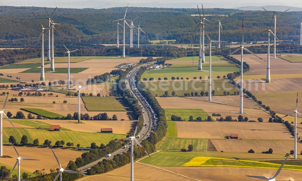 Bad Wünnenberg from above - Wind turbine windmills on a field along the BAB A44 in Bad Wuennenberg in the state North Rhine-Westphalia, Germany