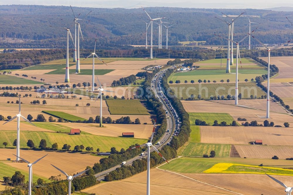 Bad Wünnenberg from the bird's eye view: Wind turbine windmills on a field along the BAB A44 in Bad Wuennenberg in the state North Rhine-Westphalia, Germany