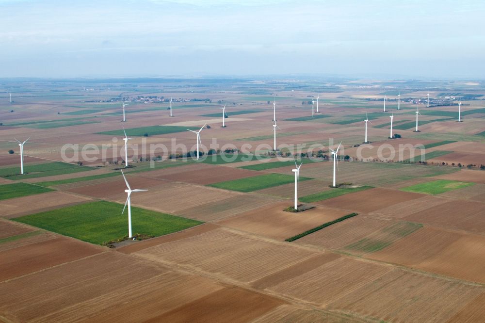 Flomborn from the bird's eye view: Wind turbine windmills on a field in Flomborn in the state Rhineland-Palatinate