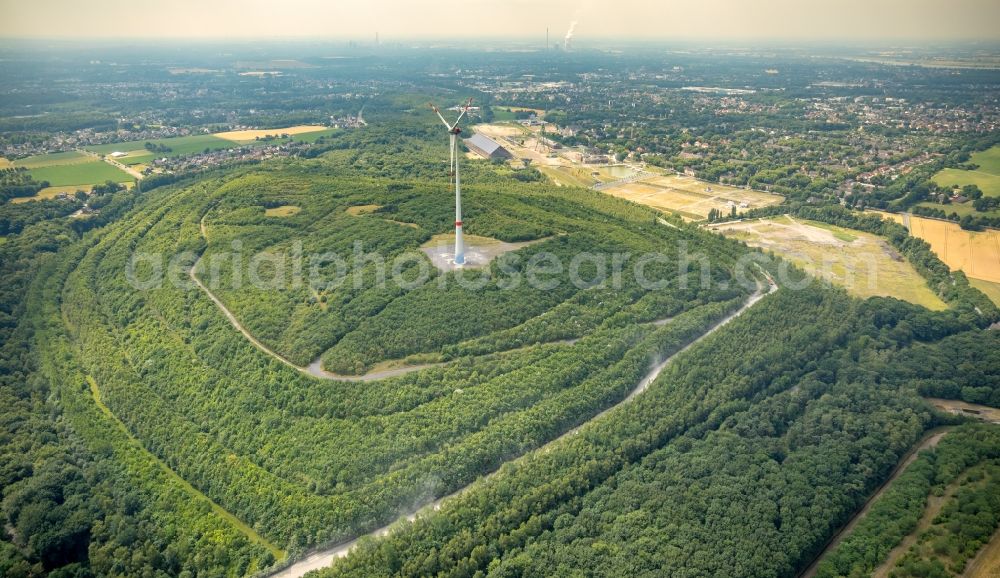 Aerial photograph Hünxe - Wind turbine windmills on a field in Huenxe in the state North Rhine-Westphalia, Germany